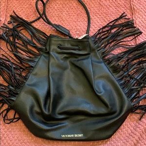 Victoria’s Secret drawstring fringe bag.